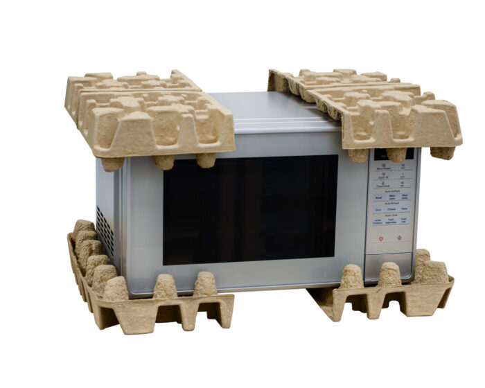 EGI moulded fibre corner protection installed on a microwave